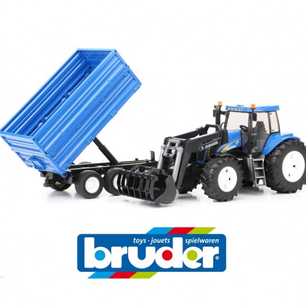 raktor New Holland sa kašikom i prikolicom 